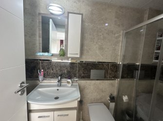 GÜLLÜK'TE DENİZ MANZARALI EŞYALI 2+1 DAİRE