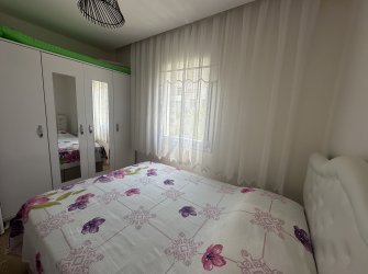GÜLLÜK'TE DENİZ MANZARALI EŞYALI 2+1 DAİRE