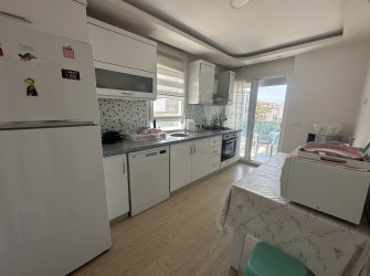 GÜLLÜK'TE DENİZ MANZARALI EŞYALI 2+1 DAİRE