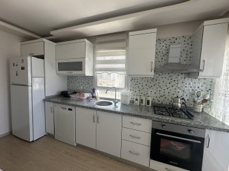 GÜLLÜK'TE DENİZ MANZARALI EŞYALI 2+1 DAİRE