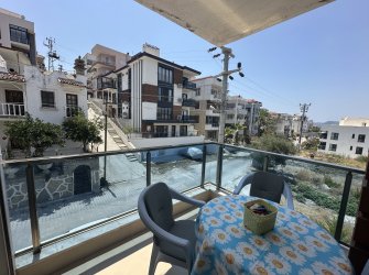 GÜLLÜK'TE DENİZ MANZARALI EŞYALI 2+1 DAİRE