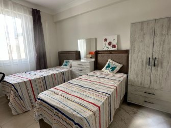 GÜLLÜK'TE HAVUZLU SİTE İÇERİSİNDE DENİZ MANZARALI 2+1 DAİRE
