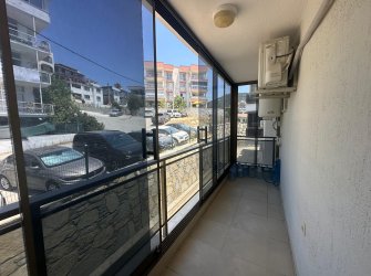 GÜLLÜK MERKEZDE DENİZE 50 METRE UZAKLIKTA HAVUZLU SİTEDE 2+1