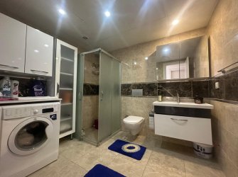 GÜLLÜK MERKEZDE DENİZE 50 METRE UZAKLIKTA HAVUZLU SİTEDE 2+1
