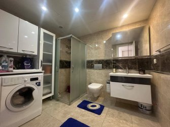 GÜLLÜK MERKEZDE DENİZE 50 METRE UZAKLIKTA HAVUZLU SİTEDE 2+1