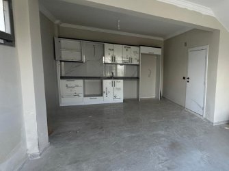 GÜLLÜK MERKEZDE DENİZ MANZARALI BAHÇE KULLANIMLI DAİRE