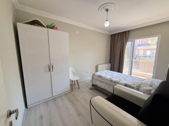 Güllük'te Deniz Manzaralı Sahile Yakın, Eşyalı Satılık 2+1 Daire