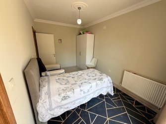 Güllük'te Deniz Manzaralı Sahile Yakın, Eşyalı Satılık 2+1 Daire