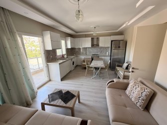 Güllük'te Deniz Manzaralı Sahile Yakın, Eşyalı Satılık 2+1 Daire
