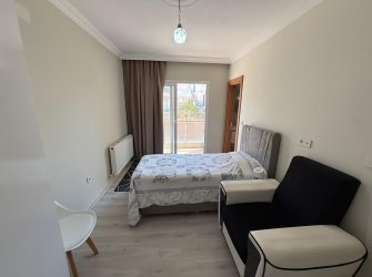Güllük'te Deniz Manzaralı Sahile Yakın, Eşyalı Satılık 2+1 Daire