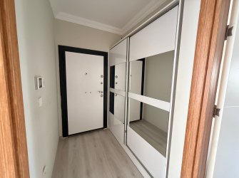 Güllük'te Deniz Manzaralı Sahile Yakın, Eşyalı Satılık 2+1 Daire