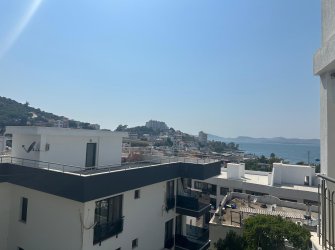 Güllük Merkezde Full Deniz Manzaralı 1+1 Satılık Daire