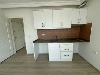 Güllük Merkezde Full Deniz Manzaralı 1+1 Satılık Daire