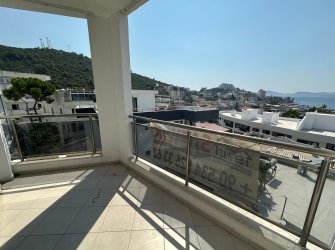 Güllük Merkezde Full Deniz Manzaralı 1+1 Satılık Daire