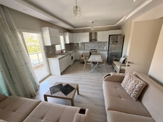 Güllük'te Deniz Manzaralı Sahile Yakın, Eşyalı Satılık 2+1 Daire