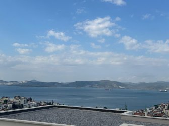 GÜLLÜK MERKEZDE DENİZ MANZARALI BAHÇE KULLANIMLI DAİRE